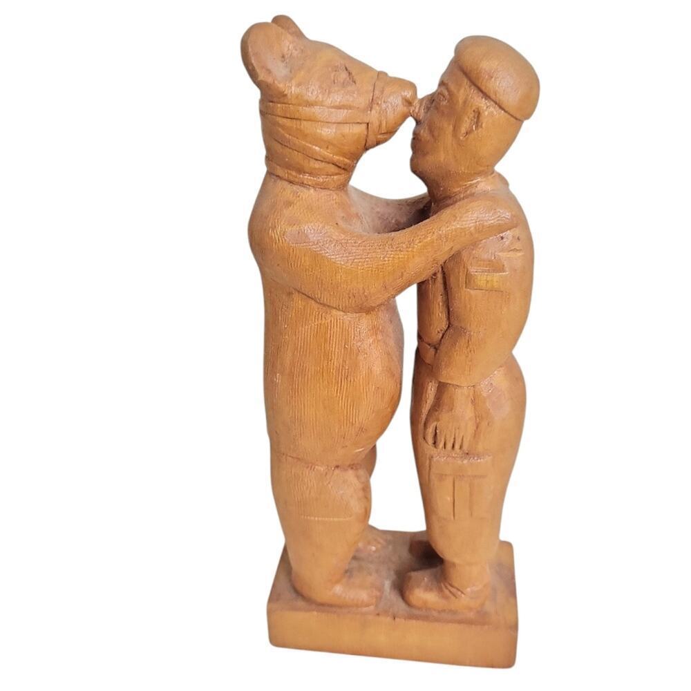 Browny Mascot Man Holding Bear Hand Craved Wood Sculpture